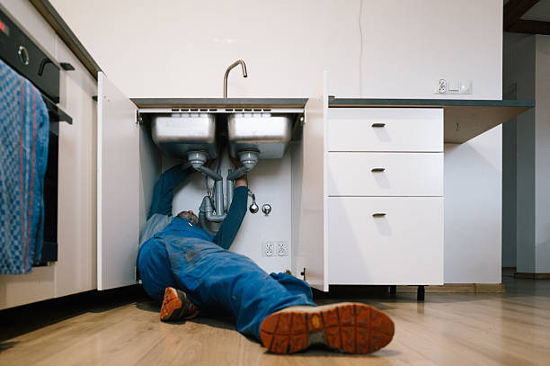 Professional Emergency Plumber technician working in Somersville, CT